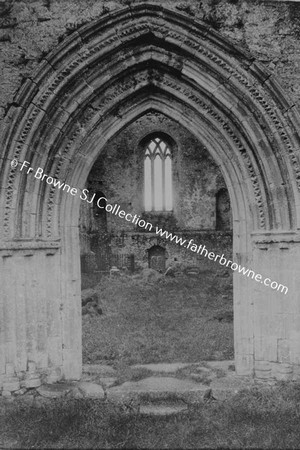 ATHASSEL PRIORY  ENTRANCE TO CHANCEL FROM NAVE